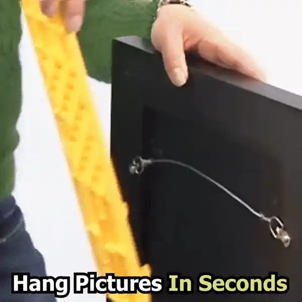 Artwork mounting device in action